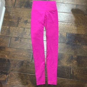 Like new! Hot pink Lululemon leggings size 4